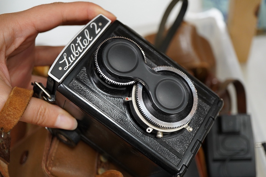 A collection of photography accessories including; two Konica lenses, a Minolta lens, a Makinon lens and a Tamron auto tele converter 2x K-EE